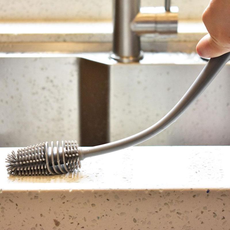 Brush with a long handle for bottle cleaning. Brush with a long handle for bottle cleaning.